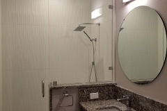 LED vanity fixture and ceiling lighting in the shower