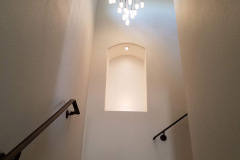 Contemporary style LED light fixture installed in a stairwell