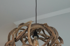 Custom-made light fixture by DB Electrical using vines-provided by customer