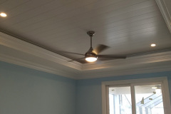 Ceiling lights and fan installed in tongue and groove ceiling