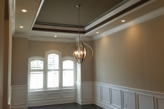 Dining room with 4-inch recessed LED cans around the outside-and-a dining room fixture in the center