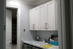 Laundry room with 15-inch round LED fixtures