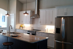 Ceiling lighting pendant lights and under cabinet LEDs in a new Palm Coast home