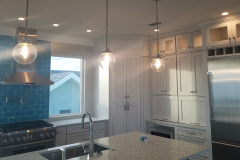 Flagler Beach kitchen with pendant lights, ceiling LED cans and interior cabinet lighting