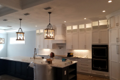 Interior cabinet lighting, pendant lights and under-cabinet lighting in a new kitchen