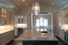 Kitchen with pendant lighting, LED ceiling lights, interior cabinet lighting, under-cabinet lighting and hidden outlets - Ormond Beach