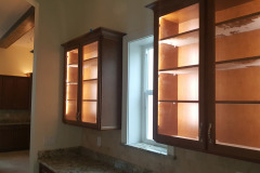LED tape on the inside of glass cabinet doors