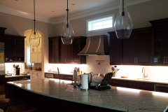 Under-cabinet lighting is better for preparing food and also provides a soothing nighttime lighting option-